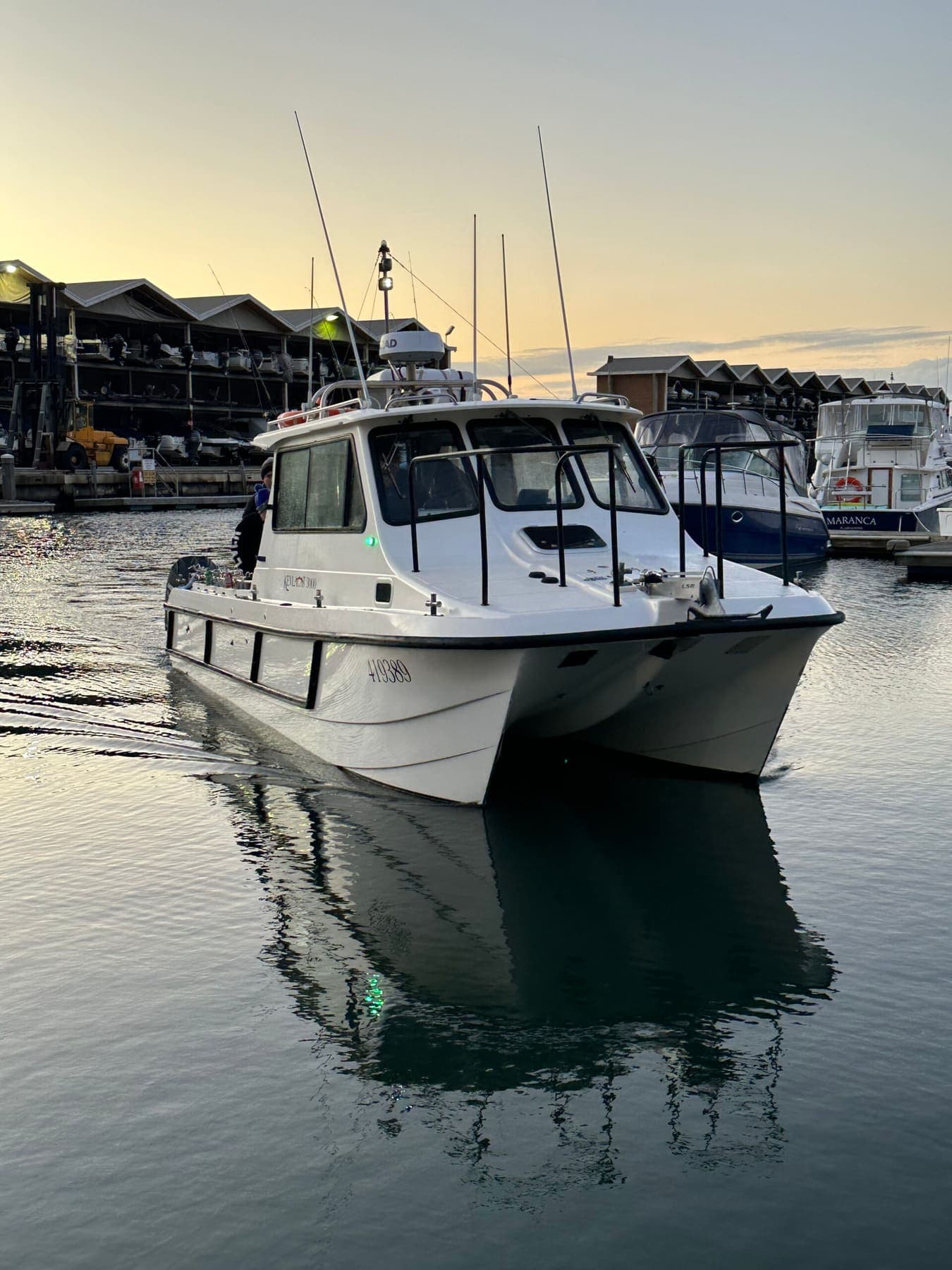 The charter boat tied up at the marina before a trip